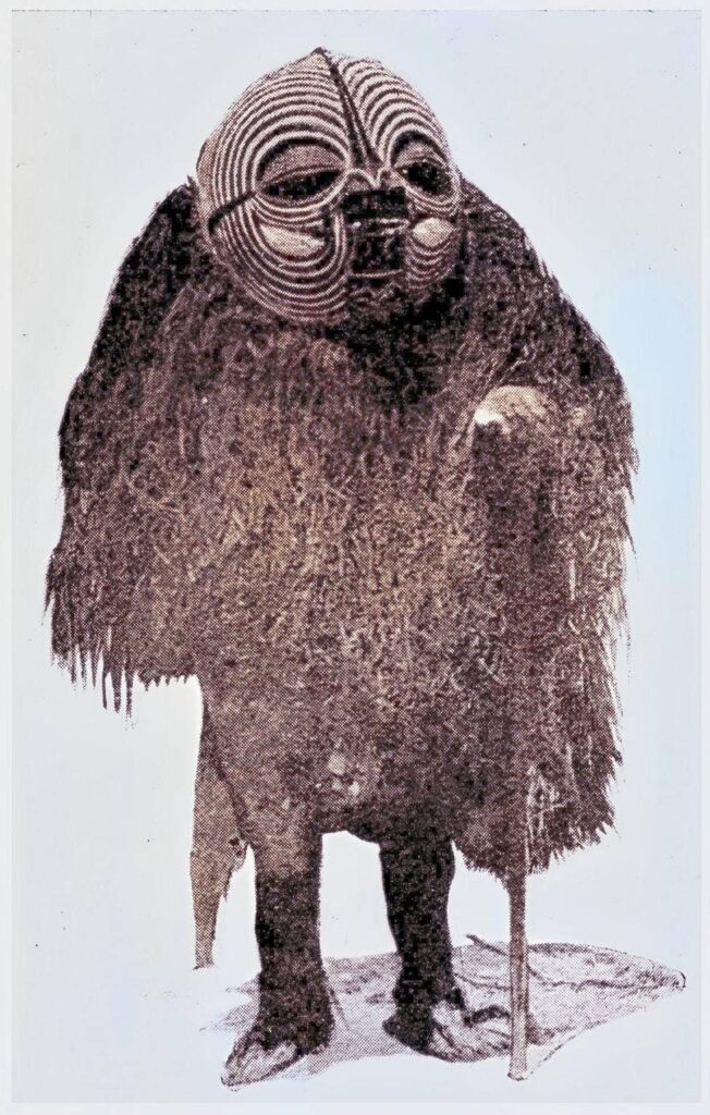 A sorcerer from Dr congo wearing a kifwele mask